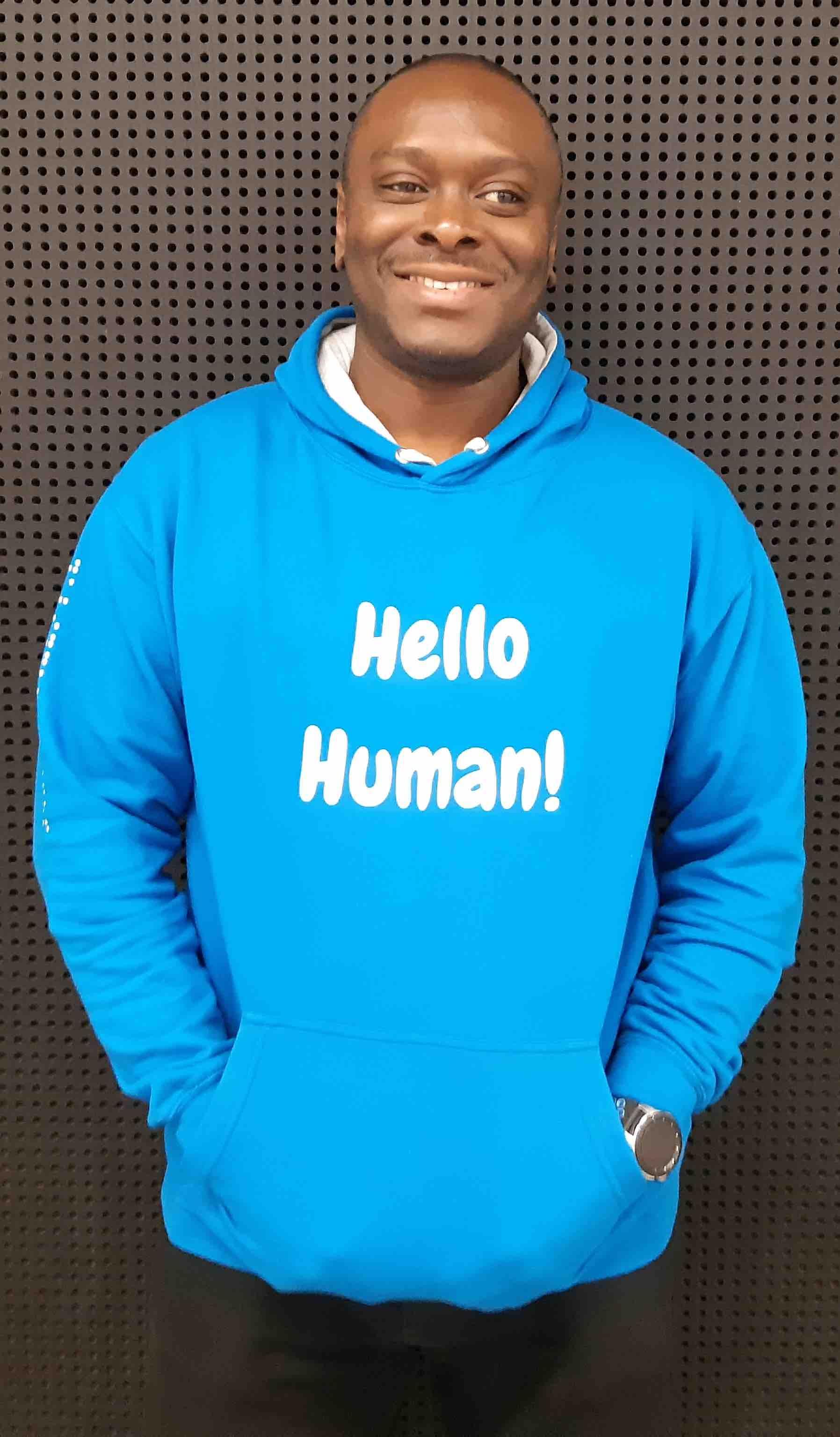 Picture of David Degbor wearing a Hello Human sweatshirt